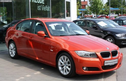 BMW 3 Series E90 in Valencia Orange color
