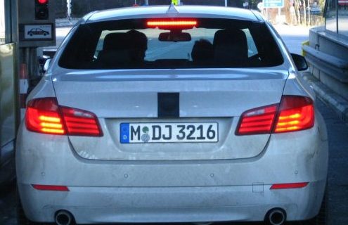 2011 BMW 5 Series spied in Alpine White