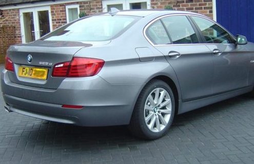 One of the first customers to pick up a new 2011 BMW 5 Series