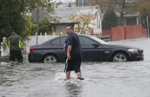Sandy leaves some BMWs under the water