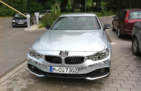 BMW 4 Series Coupe spied with minimal camouflage