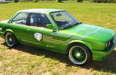 Electric BMW E30 3 Series racing a Tesla