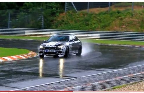 The new F10 BMW M5 drifting in the wet at Nurburgring 