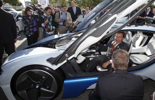 Governor Arnold Schwarzenegger behind the wheel of Vision Concept